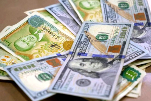 التحسن المستمر بسعر الليرة السورية...الدولار يهبط لما دون الـ 9000 ليرة سورية