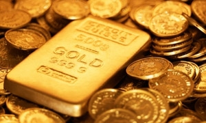 الذهب يوسع خسائره الى أكثر من 2% والفضة تهبط 5%