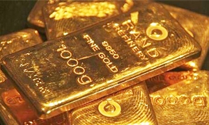الذهب ينخفض دون 1400 دولار