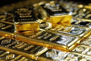 الذهب يهبط بعدما عزز محضر اجتماع المركزي الأمريكي توقعات رفع الفائدة