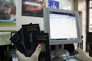 موظفون في مالية دمشق يجبرون المواطنين على شراء ورقة مجانية لإصدار جوازات السفر